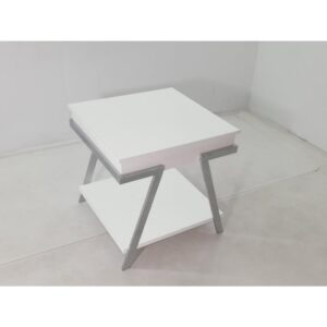 Go full-on modern with a casual feel that delivers a surprising energetic boost. This ultra-contemporary end table made of white high gloss finish MDF with paper coating creates a stir in your laid-back living room or family room. Angular metal framing adds a fresh aesthetic boost. A modular-like configuration works well in today’s trending spaces as this end table increases storage and display space with a lower shelf. Seek a seamless contemporary attitude with this stylish end table.