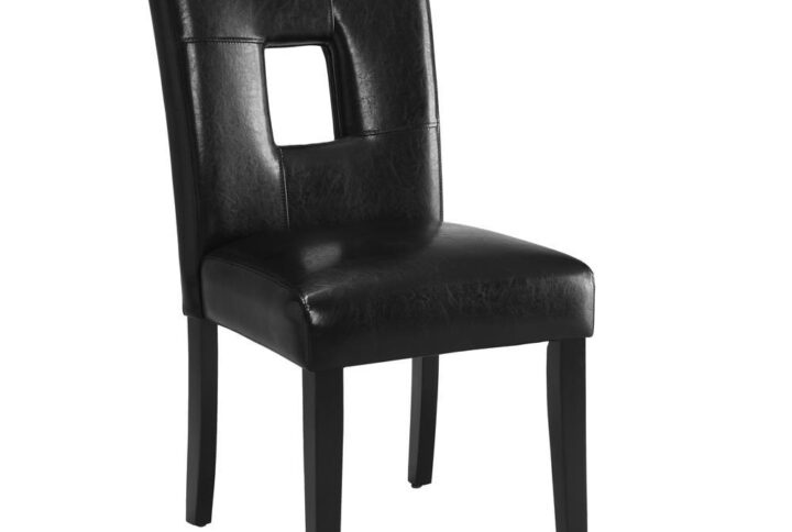Make a bold statement in your dining area with this chair from the Anisa collection. Upholstered in gloss black leatherette. Legs are finished in dark cappuccino. The cushioned seat back features an open square right in the center. Although meant to be casual
