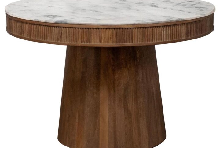 Introduce elegance into your dining space with our round white marble top dining table. The luxurious marble top adds a touch of sophistication