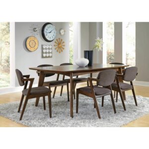 This handsome seven-piece dining set is sure to meet every expectation for a stylish and functional dining space. This transitional style dining set boasts modern elements