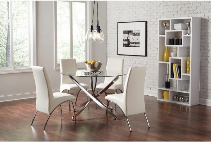 You'll love the comfort and aesthetics of this contemporary five-piece dining set featuring chrome and glass. The set includes a round glass table and four Z-shaped padded chairs for a visually stunning element. The extra thick tempered glass tabletop sits on a chrome finish asterisk metal base that draws the eye. Each funky chair is crafted with alluring contours and white leatherette for stunning style. The base and legs come in shiny chrome finish that imparts glam and panache.