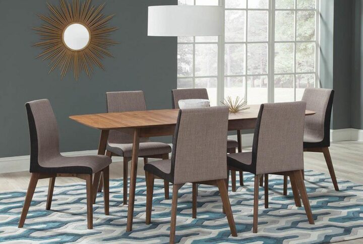 Captivating style lends an intriguing flavor. This dining chair offers sleek curves that increase its comfort level and aesthetic appeal. grey fabric upholstery offers a cool