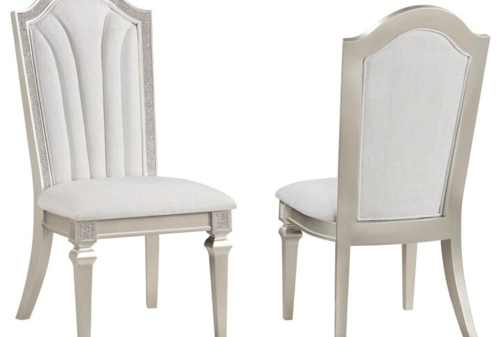Instill modern glam sophistication in your dining room with a gorgeous set of two dining chairs. Each features a tall back with a graceful arch