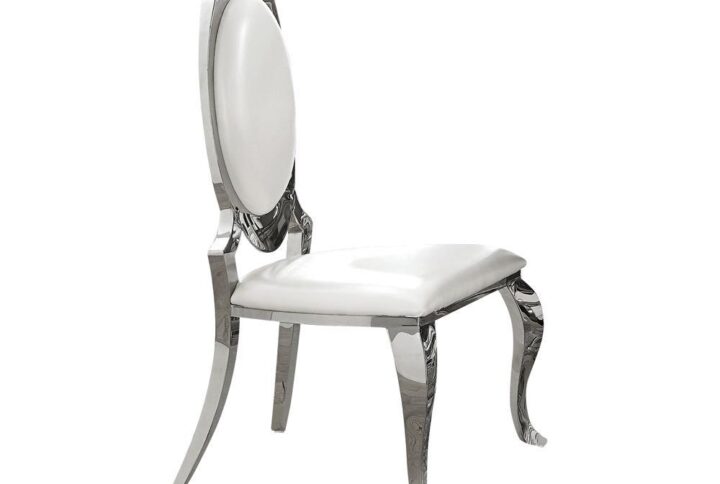 Regal ambiance in a transitional package. Enjoy a hint of fresh modern style in this dining chair. A traditional silhouette features a lovely oval seat back and ornate curved legs. Creamy white upholstery delivers a bright effect that contrasts with a chrome finish frame. Lift the personality of any space with this exceptional dining chair.