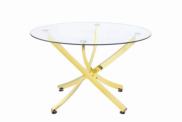 Stay on the edge of contemporary glamour. This dinette table indulges a love of clear glass and embellishes it with a radiant brass finish frame. Artfully designed
