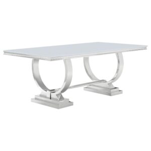 Elevate your dining experience with our 5-piece dining set. The elegant dining table features an expansive opaque white tempered glass surface. Its stainless steel trestle base