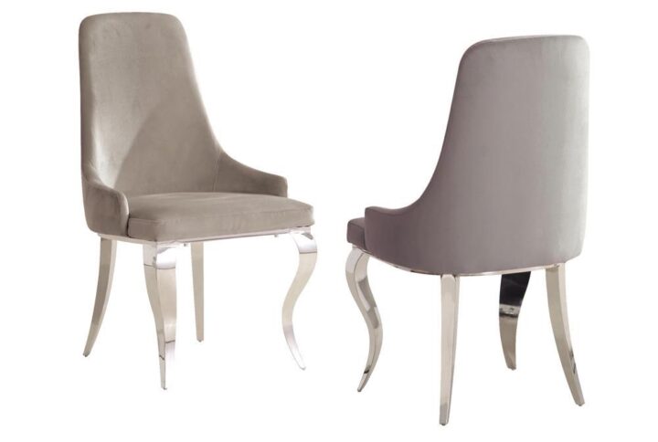 Immerse yourself in the epitome of elegance and comfort with our upholstered side chairs. These chairs exude luxury