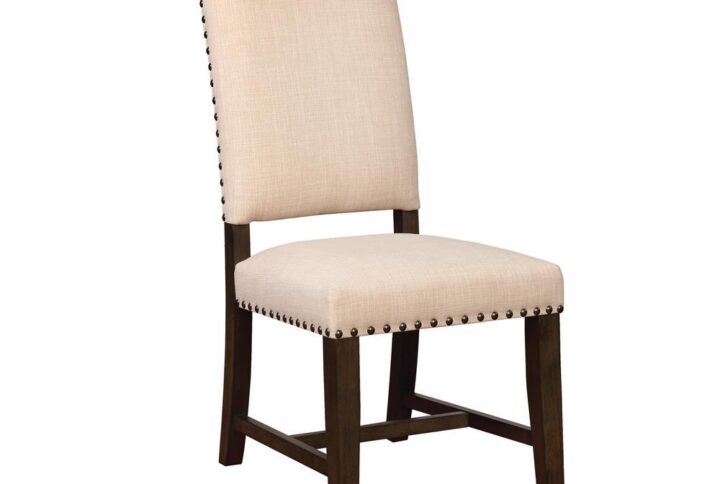 Pull up this simple classic Parsons chair to your favorite casual dining table and grab a fork. Clean lines and gently flared back. Armless chair makes it easy to reach for a second helping or sneak a bite to a doe-eyed furry beggar. Beautifully upholstered in cool beige fabric. So casual and comfortable