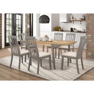 A noticeably pleasing finish palette stands out in the elegant design of this seven-piece wood dining set. Dress up your casual space with a surprisingly light look and interesting blend of colors. Start with a modern design in a natural acacia finish wood table with a true square edge. Angled legs feature a stunning coastal gray finish