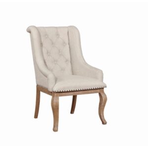 Gracefully swooping arms create an engaging silhouette for this dining armchair. Beautiful in a refined space