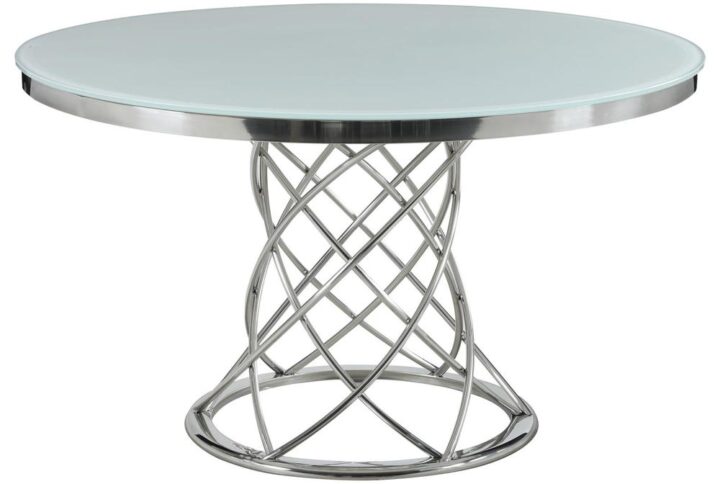 Get lost in the details of this contemporary Italian-inspired five-piece dining set. A spectacular base is intricately designed with overlapping legs that form into one unit at the base. A tempered glass tabletop has a sleek and stylish appeal that plays off of the chrome base. Minimalist chairs feature soft velvet upholstery in a light grey with contoured seating to ensure exceptional comfort during every dining experience. Meanwhile