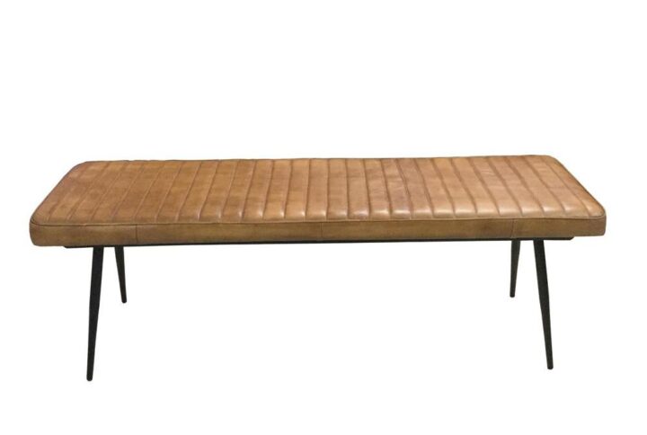 Pull up this long upholstered bench seating to a dining table or place at the foot of a bed. Perfect for an industrial style loft apartment or modern farmhouse home