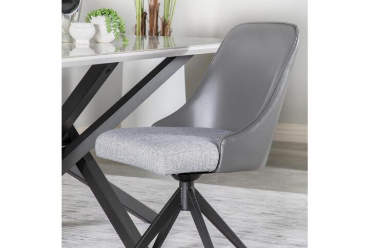 Retro-inspired influences elevate this modern dining chair into a playful seat at the table. Designed as a swivel chair