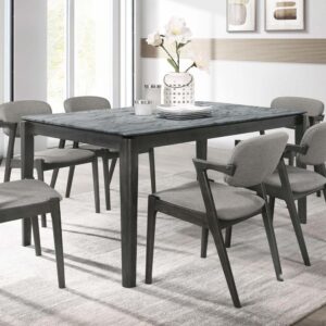 Gather around this mid-century modern dining table for a casual dining experience. Designed with a faux marble top that offers extra resistance to stains and the like