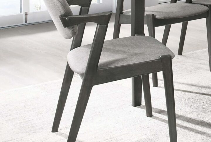 Clean lines and dramatic angles elevate this mid-century modern Z-chair. Designed with a padded backrest and seat