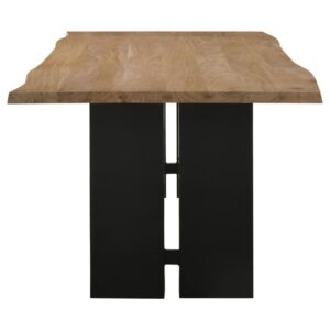 adding a touch of natural charm. Contrasting with the sleek double pedestal black iron legs