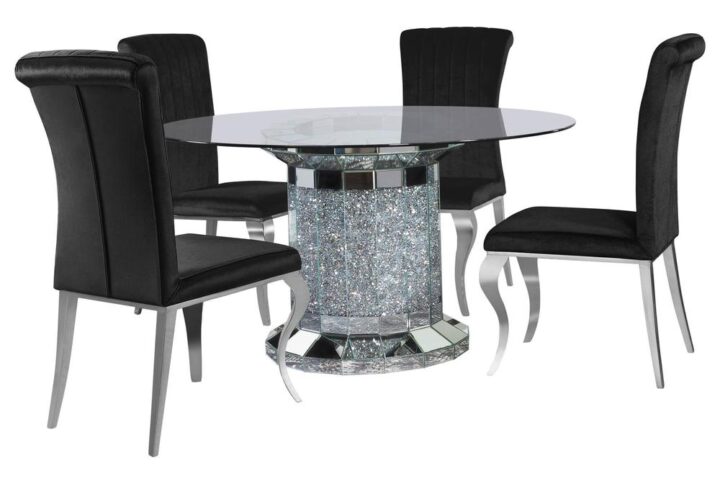 Invite over a few guests to celebrate at this modern glam dining table. A round