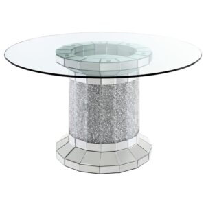 clear glass top reveals the scintillating column-inspired pedestal frame beneath