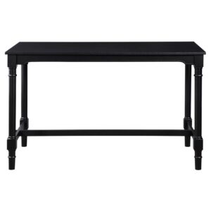 the rectangular table comfortably seats four and features a black finish and subtly turned legs for cottage inspired charm. The matching stools also have classic spindle legs in a black finish and comfortable oatmeal upholstered seats.