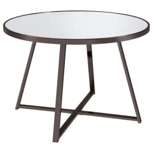 Gather for delicious meals with your favorite people in chic style with this contemporary dining table. The round table epitomizes modern minimalist design principles while adding decorative flair with subtle geometric touches in its angular