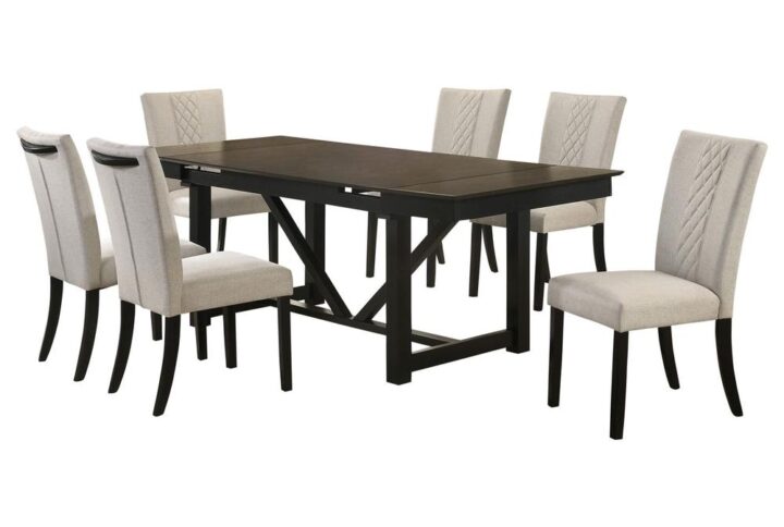 Bring transitional style to your dining room with this sleek and practical collection. The two-tone finish of the oak top and black trestle base complements any décor style