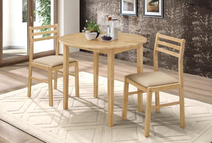 This lovely dining set lends an elegant touch of simple sophistication to a kitchen or breakfast nook. It comes complete with a lovely