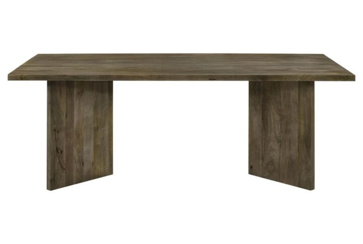 Introduce a modern and eco-friendly statement piece to your dining room with this exquisite mango wood dining table. Crafted from sustainable mango wood