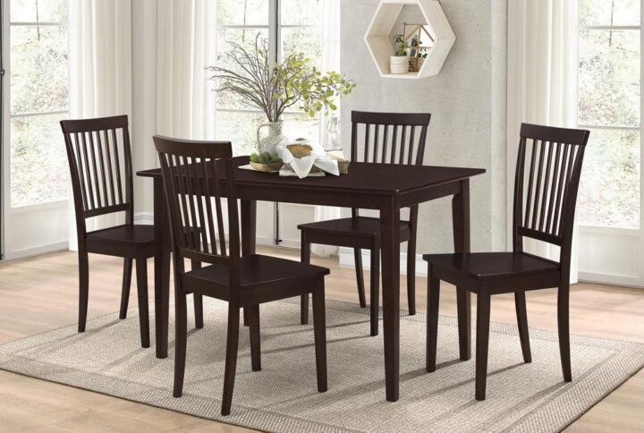 Go all-in on a classic motif with this five-piece dining set. Full of clean lines