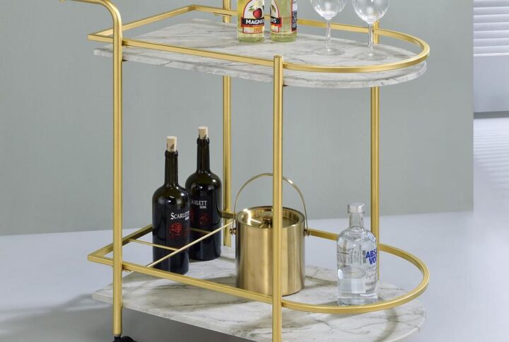 Invite guests over for an intimate soiree and serve up cocktails on this contemporary bar cart. Classic faux white marble shelves stack on top of one another