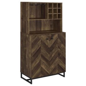 this charming wine cabinet also features a rustic oak finish that complements many color palettes and styles and a metal base and hardware that add mixed media charm. Clean lines and an open bar top with plenty of storage space create a go-to mixing station to serve up guests or grab a nightcap. Designed with a two-door cabinet below that opens to reveal four cubbies
