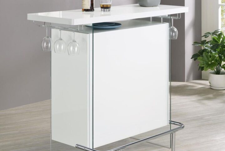 Elevate a multipurpose living room with this modern bar unit. A neutral finish