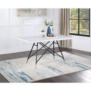 Make a statement in your small space with this rectangular dining table. Its sleek white marble top exudes elegance