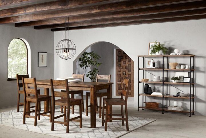 Make the most of laid-back farmhouse style with a counter-height dining set that serves both semi-formal and casual entertaining needs. With a lush