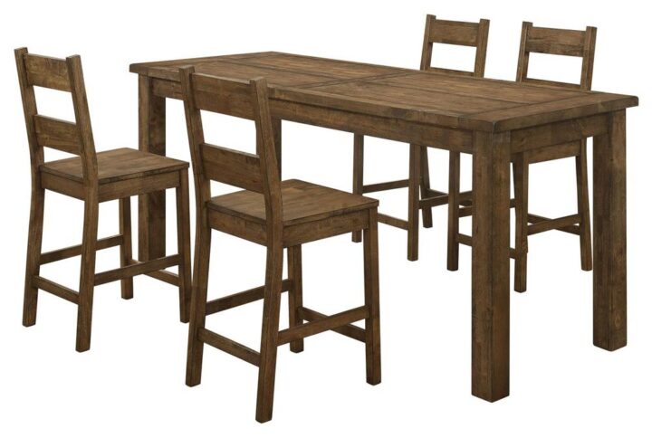 Share a homecooked meal together around this charmingly simple 5-piece counter height dining set from the Coleman collection. A rustic golden brown finish brings out the rich grains of the solid hardwood construction. Farmhouse chic is a trending look right now
