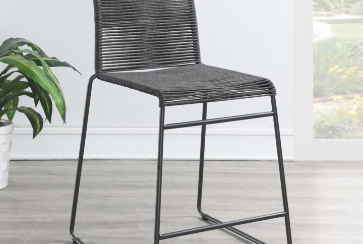 Create visual texture with this contemporary rope woven stool. A tall and slender metal frame in a gunmetal finish