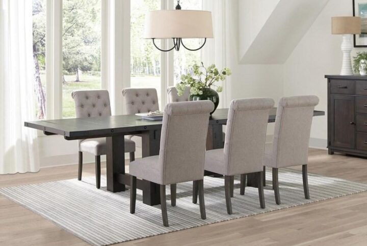 Looking for an elegant yet comfortable and semi-casual addition to your modern dining room? This dining set delivers a tasteful look of elegance with a contemporary finish palette and plenty of style. Anchored by a rectangular dining table with a bold vintage java finish and a chunky silhouette