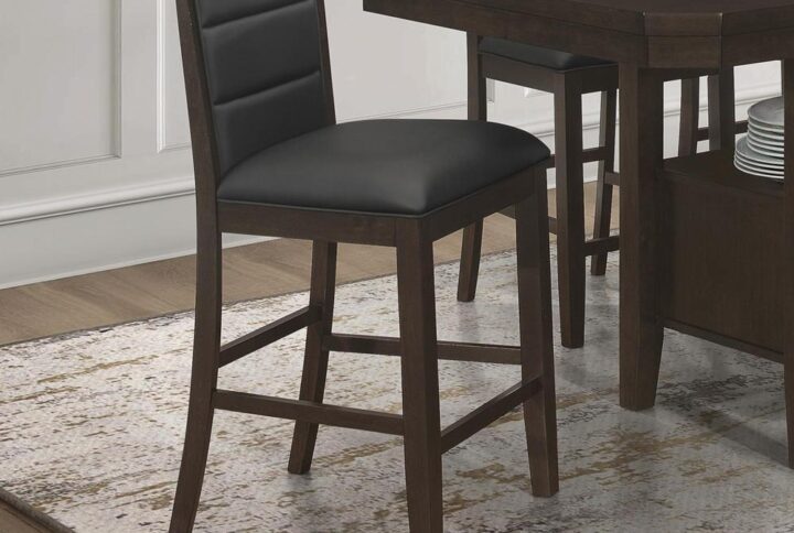 Pull up these two contemporary counter height chairs to a table for a sophisticated