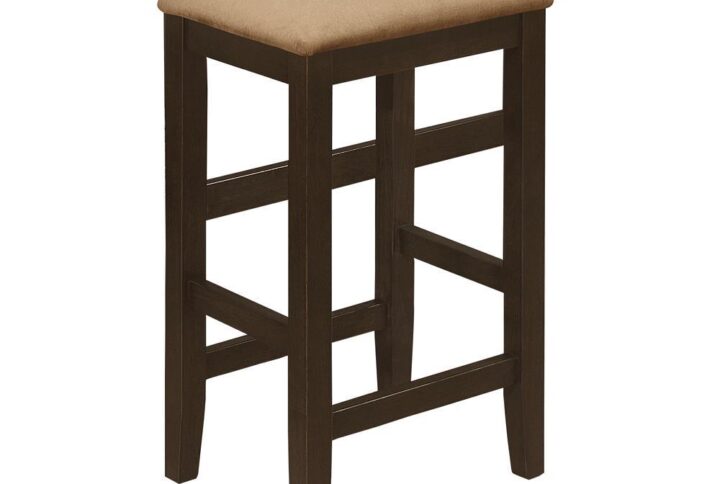 This set of four counter height stools is the perfect addition to the Carmina counter height dining table. Each stool offers a square padded cushion filled with foam for long-lasting comfort and support. A beige colored microfiber peat wrapped around each cushion