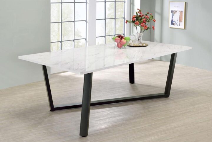 With a white marble-inspired tabletop design