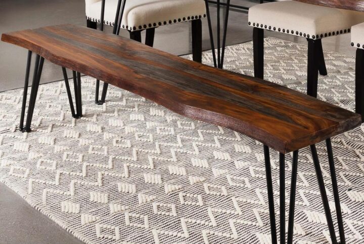 Present plenty of seating at your transitional dining table with this rustic industrial dining bench
