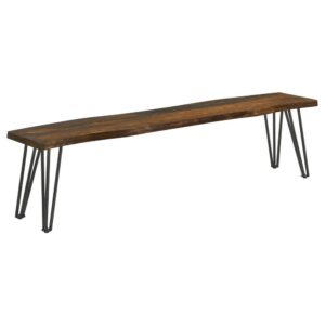 featuring a long solid sheesham wood seat covered in a grey finish complete with a live-edge detail that gives a natural touch. Gunmetal finished hairpin legs offer a mid-century modern flair and support two to three guests.