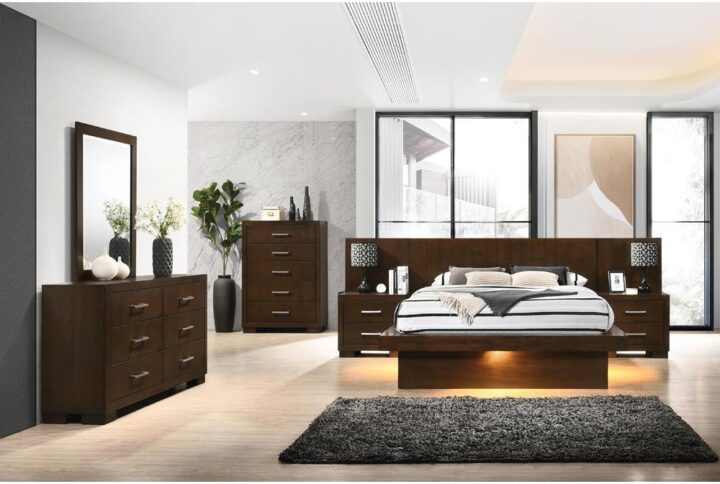 This stately 5-piece bedroom set is a showpiece set from the Jessica collection and includes a chest and dresser as well as nightstand that can be placed at arm's reach with the optional nightstand panel on the bed. The bed has smooth