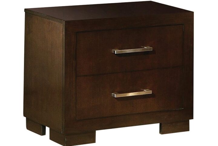 Enhance your bedroom's natural style with this lovely wooden nightstand. Its two roomy drawers include soft