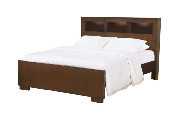 This Jessica eastern king bed strikes a lofty presence in any master bedroom collection. Headboard features three spacious open storage spaces to house a couple of alarm clocks and plenty of nighttime reading material. Low-profile footboard has contemporary charm. Finished in rich cappuccino that suits any bedroom decor. Add an optional matching side table from the same collection to complete the set.