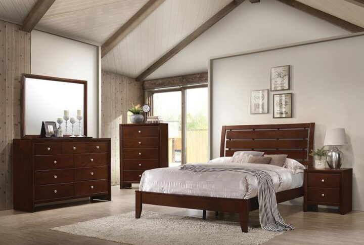 The Serenity collection features this airy 5-piece bedroom that offers an ambiance to match the name. A horizontal-slatted headboard and low footboard highlight the bed. The nightstand and chest have deep drawers for ample storage and room on top for a lamp or decorative vases. The nine-drawer dresser provides additional storage and is built to hold the accompanying rectangular mirror. The set features select hardwood construction with a magnificent rich merlot finish for years of timeless style and enjoyment.