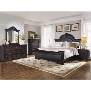 This stately 5-piece bedroom set from the Cambridge collection has a traditional design and construction that's the grand centerpiece of any master bedroom. The bed is constructed with an arched headboard with crown molding and carved details and upholstered in sumptuously padded leatherette. The dresser