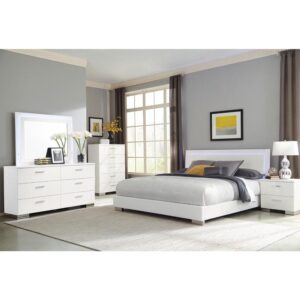 Add a bright and contemporary look to your master or guest suite with this chic bedroom set. Anchored with a bed featuring a straight-edge headboard with touch lighting