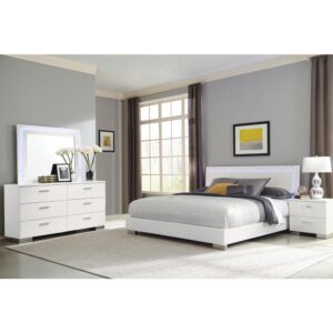Add a bright and contemporary look to your master or guest suite with this chic bedroom set. Anchored with a bed featuring a straight-edge headboard with touch lighting