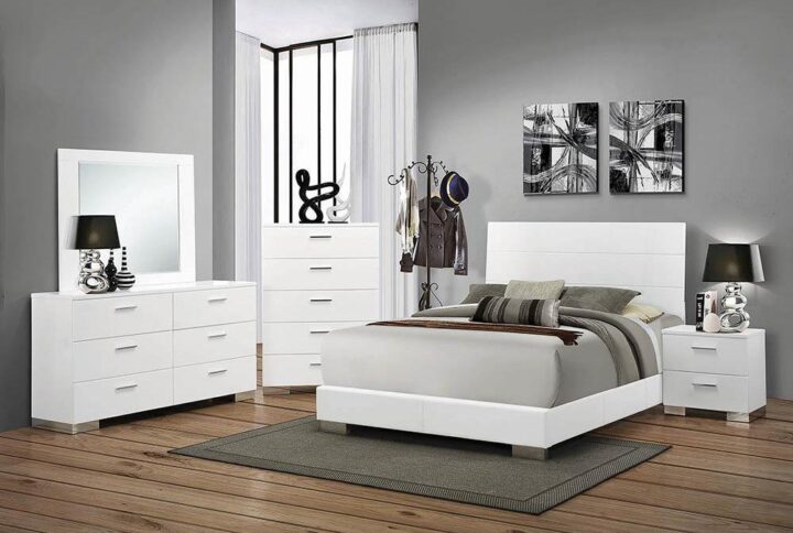 Balance and symmetry are in full style. This elegant bed stands out to capture attention. With an extra tall headboard and low-profile