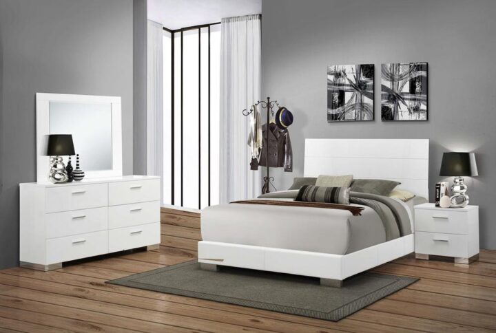 A contemporary styled home with matching master bedroom deserves this 4-piece bedroom set from the Felicity collection with its modern amenities and styling. The bed has a low-profile footboard contrasted by a high headboard with blue LED touch lighting for a modern appeal. The nightstand has two deep drawers with polished chrome metal hardware and felt-lined top drawers to protest valuables. The dresser features six drawers with identical styling to the nightstand drawers and a broad table top made to accommodate the crisp rectangular mirror. All pieces in the set are expertly finished with a brilliant white polyurethane coat polished to a high-gloss finish.